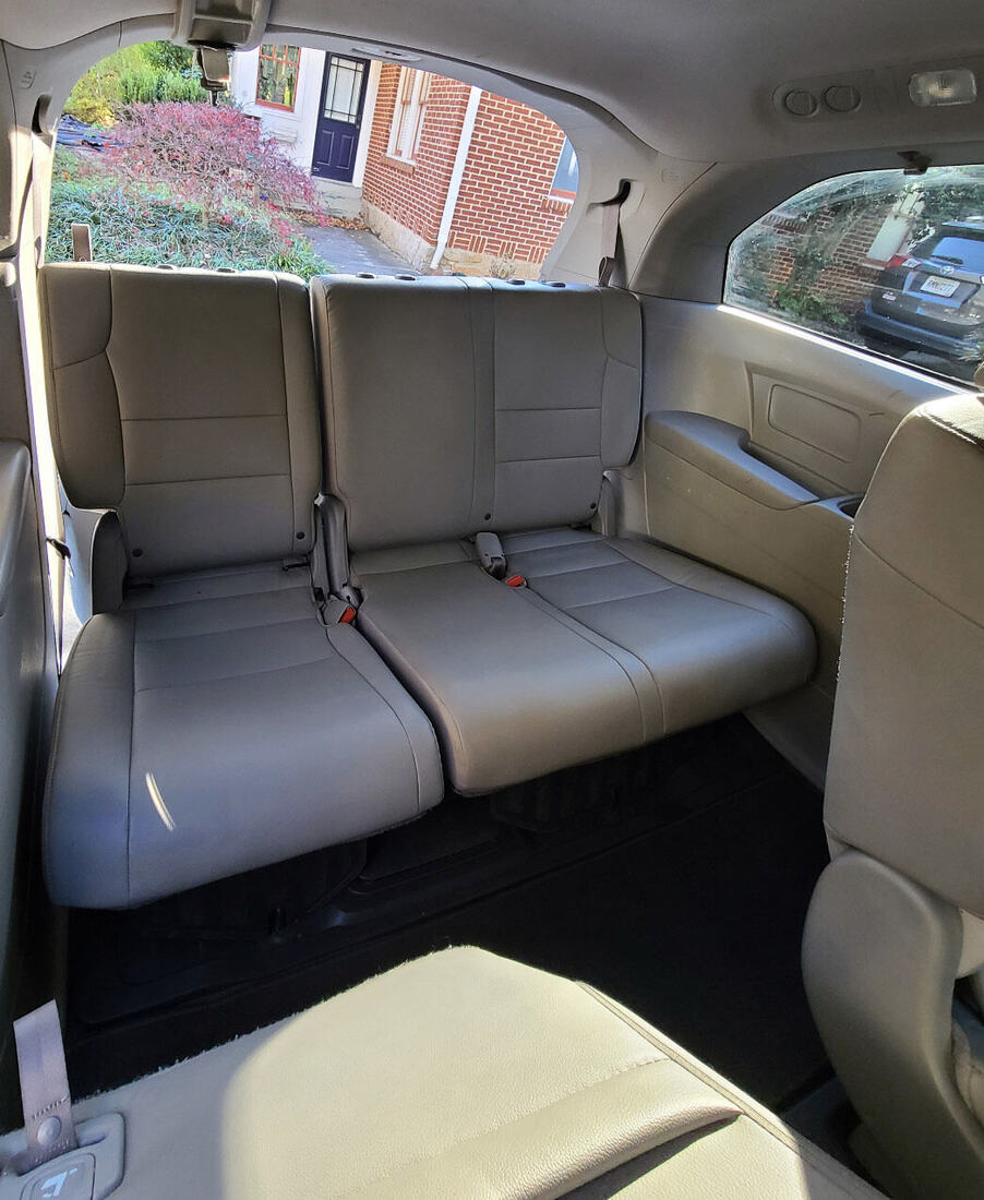 Third-row seats after a Deluxe interior